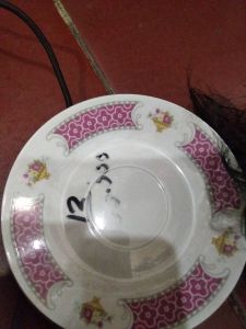 Piring batu kecil motif menara cina