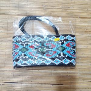 TAS MANIK KECIL