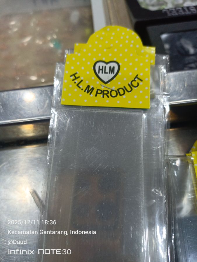 Mistar jilbab plastik kecil