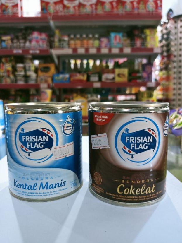 Susu Frisian flag coklat/putih