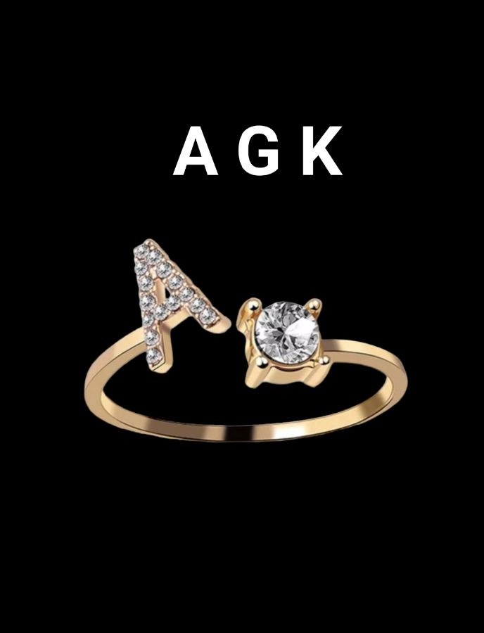 Cincin motif/huruf/permata