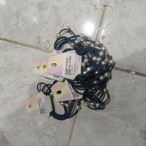 Ikat Rambut Mutiara Isi 2
