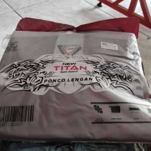 New titan ponco lengan