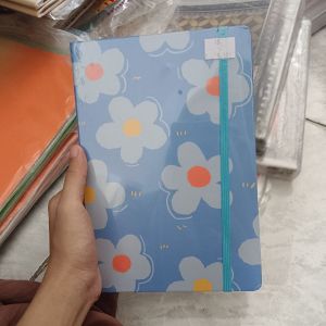Notebook In The Forest Of Flowers