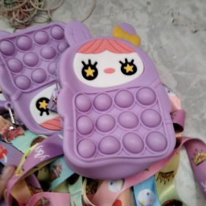 Tas pop it karakter ungu 