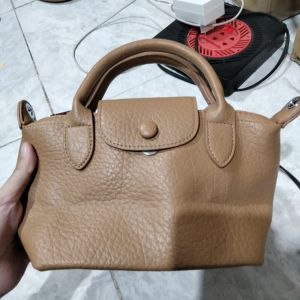 Tas selempang resleting milo