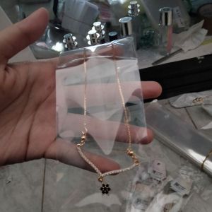 kalung titanium 