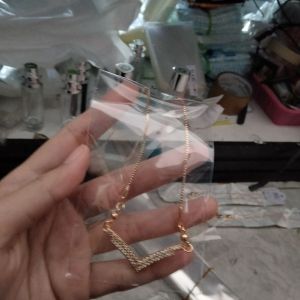 kalung titanium 