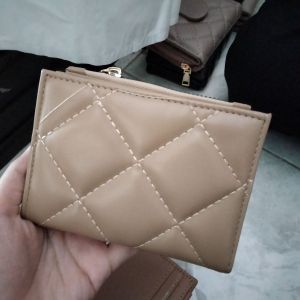 dompet fashion lipat 