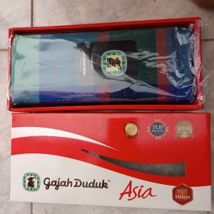Gajah Duduk Sarung Tenun Asia
