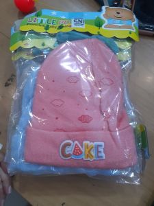 Topi rajut cake