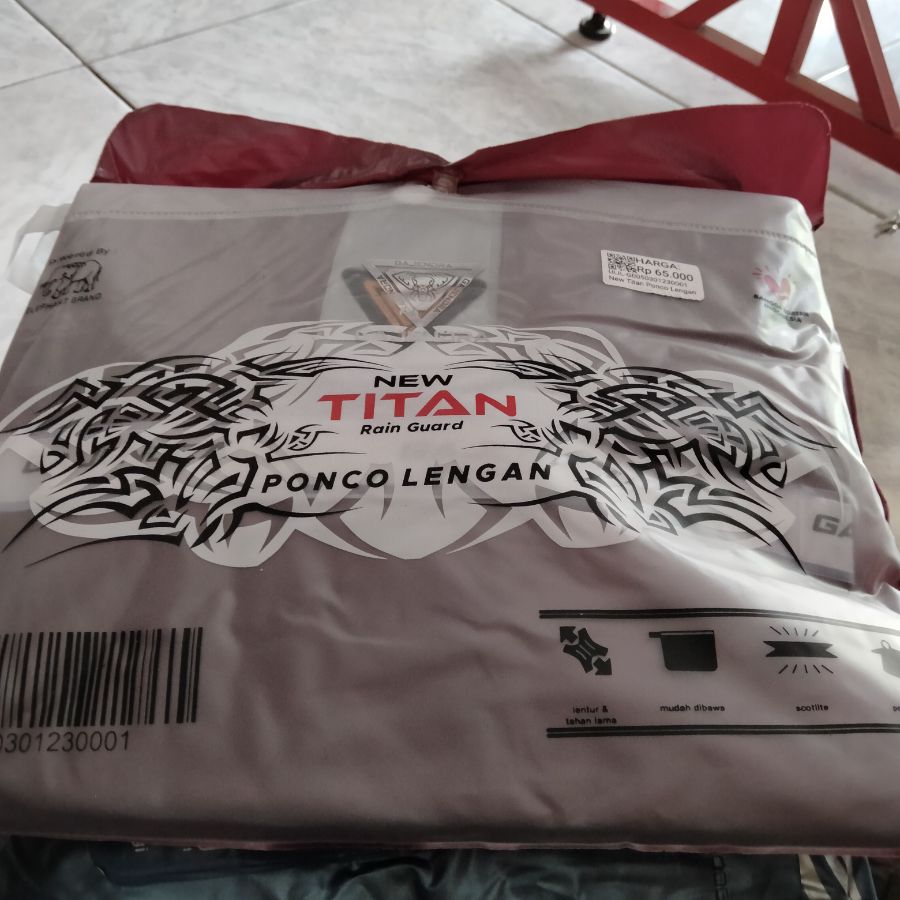 New titan ponco lengan