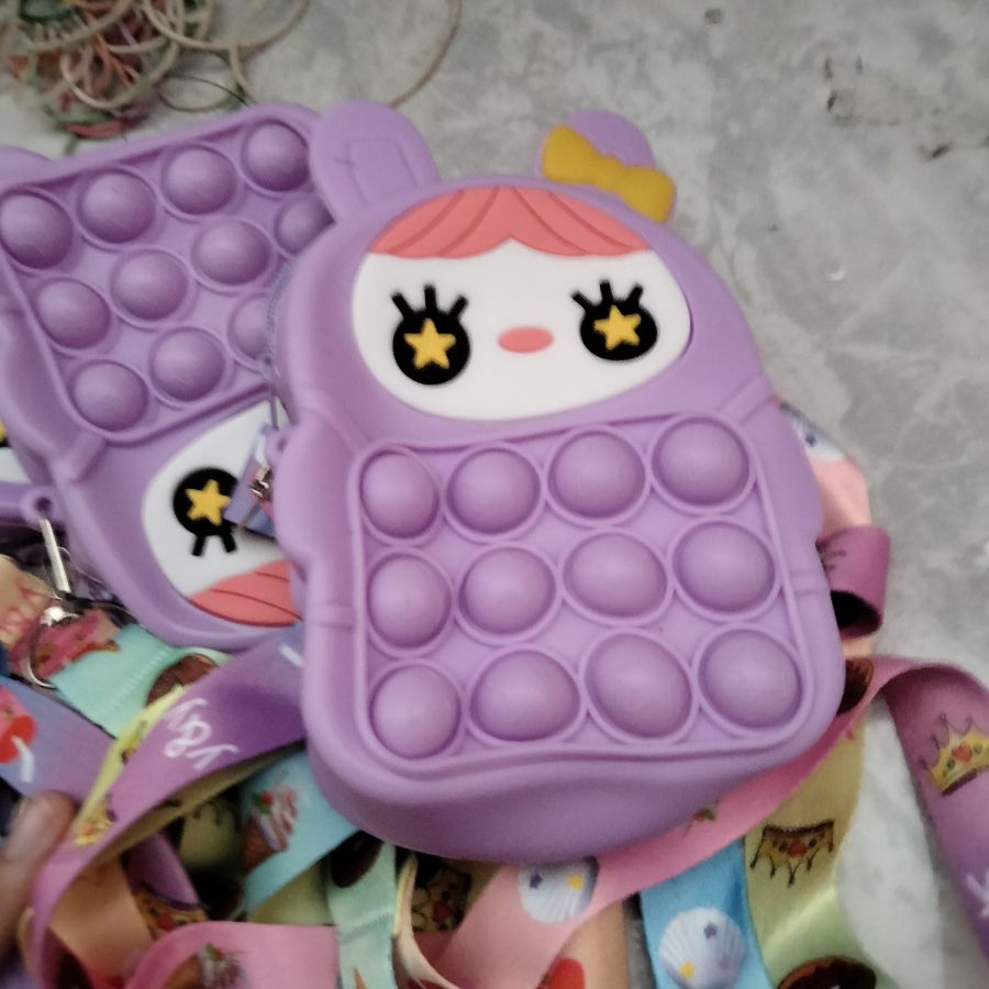 Tas pop it karakter ungu 