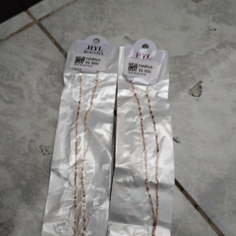 kalung titanium 