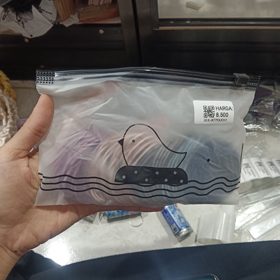 Ikat Rambut Pouch