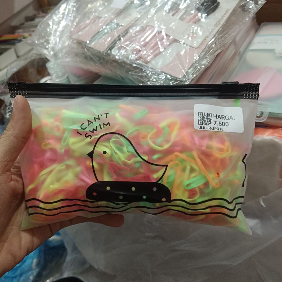 Ikat Rambut Pouch