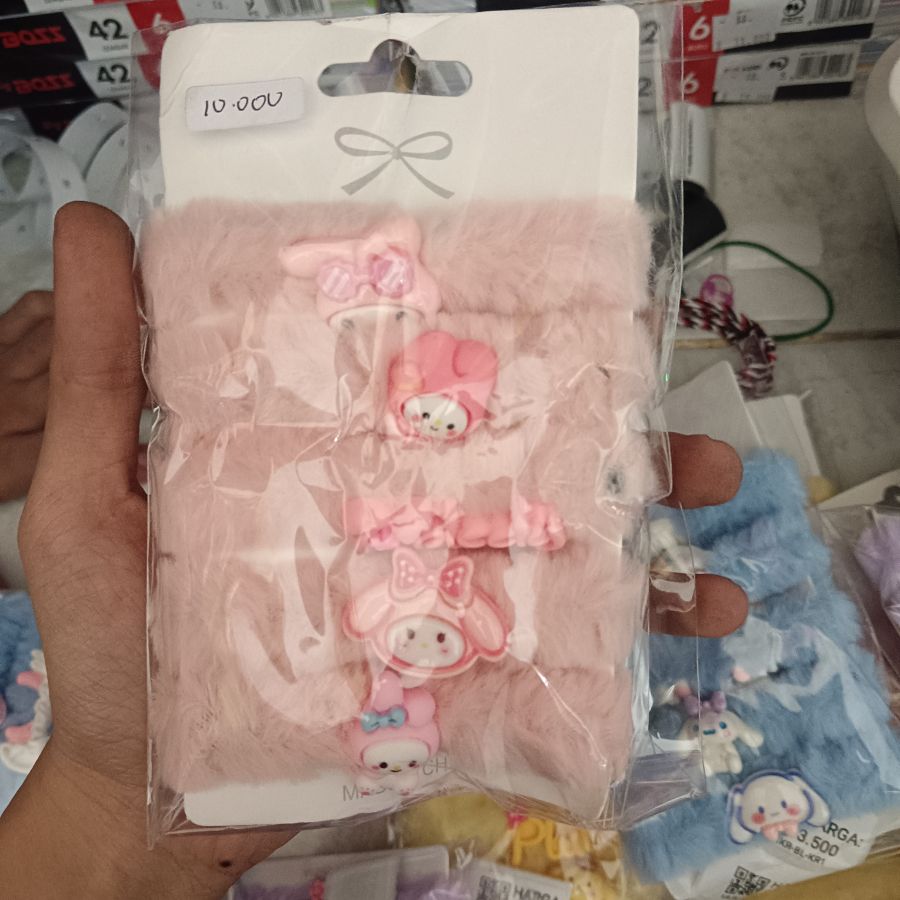 Ikat Rambut Bulu