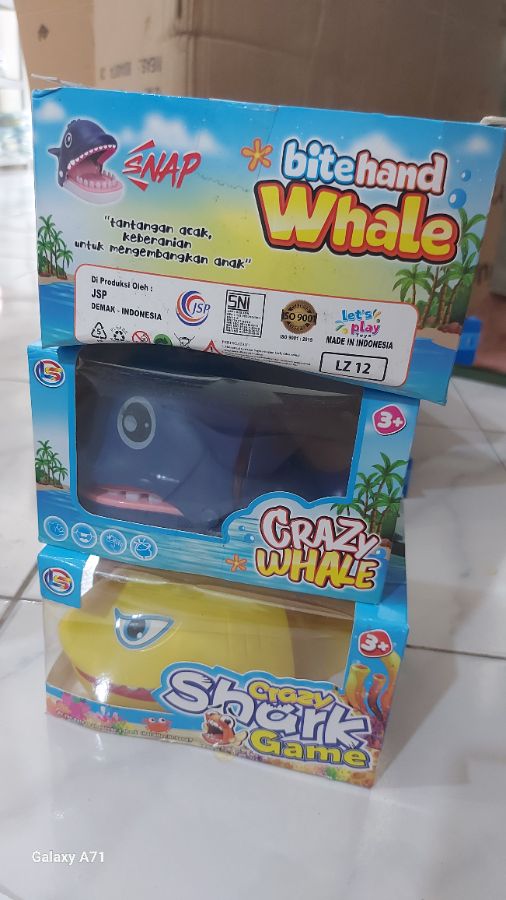 Bite hand whale