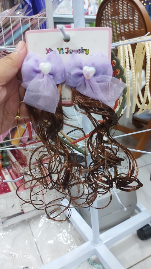 Jepit pasang rambut juray