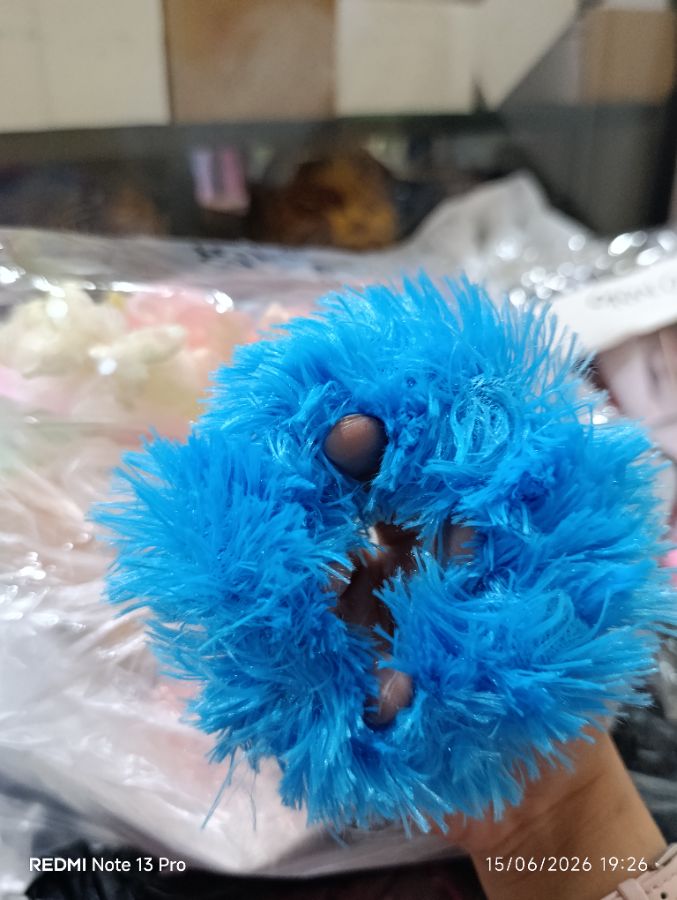 Kucir Rambut Bulu