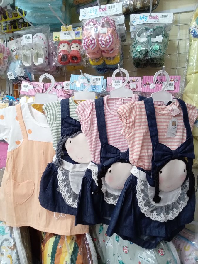 Baju kodok boneka