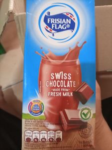 UHT Frisian Flag 946ml Cokelat / Coconut delight