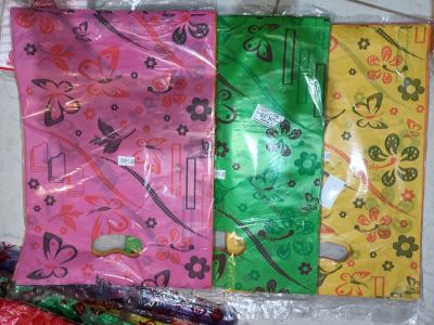 Plastik motif warna warni ukuran 25