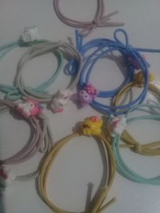 Ikat rambut pita boneka