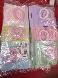 Ikat rambut spiral kar