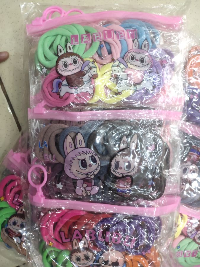 Ikat rambut tas 