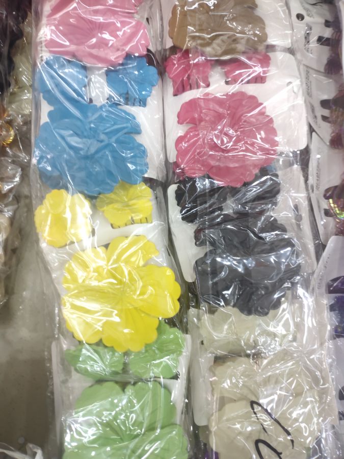 Jepitan bunga kar 