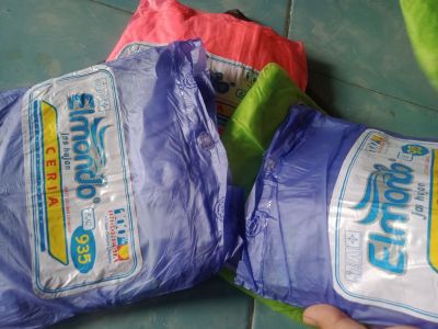 Jas hujan model baju