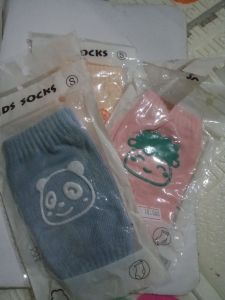 Kaos kaki lutut pelindung