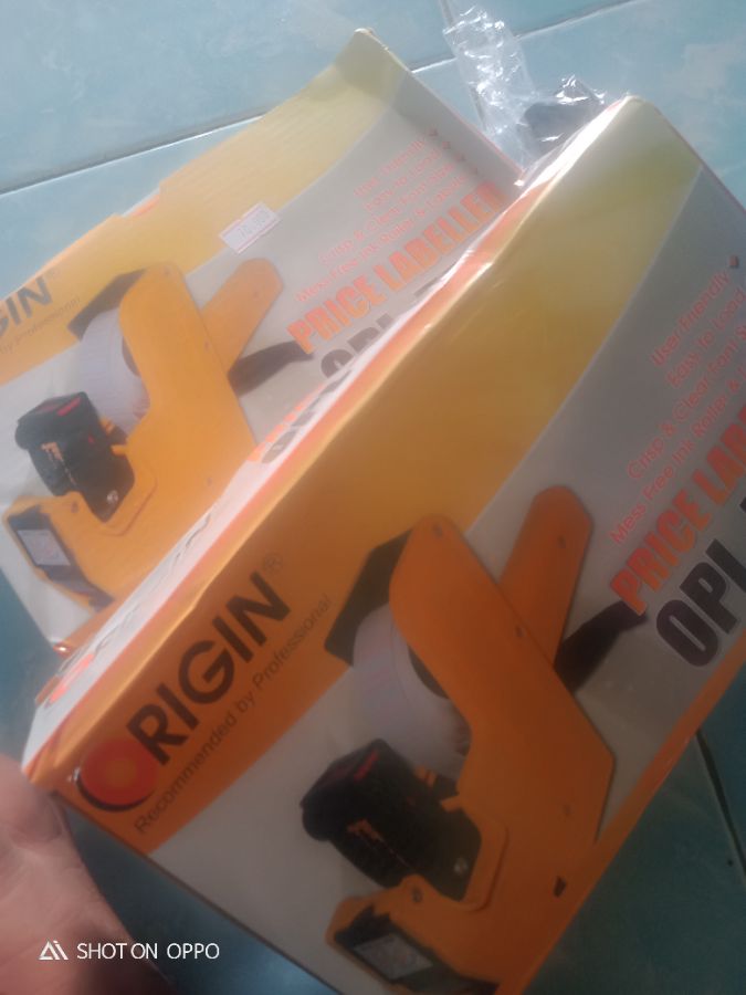 Mesin label harga merk rigin