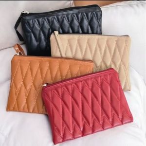 Tas tangan lala